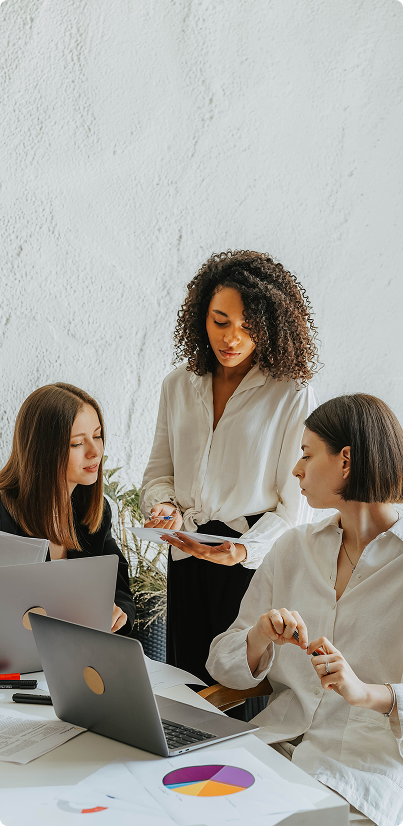 Women collaborating with laptop